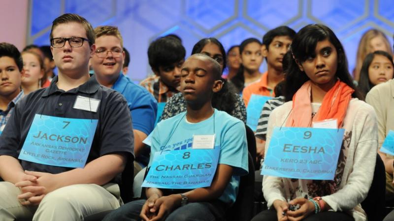 Charles Hamilton seated among spellers at the 2015 Scripps National Spelling Bee
